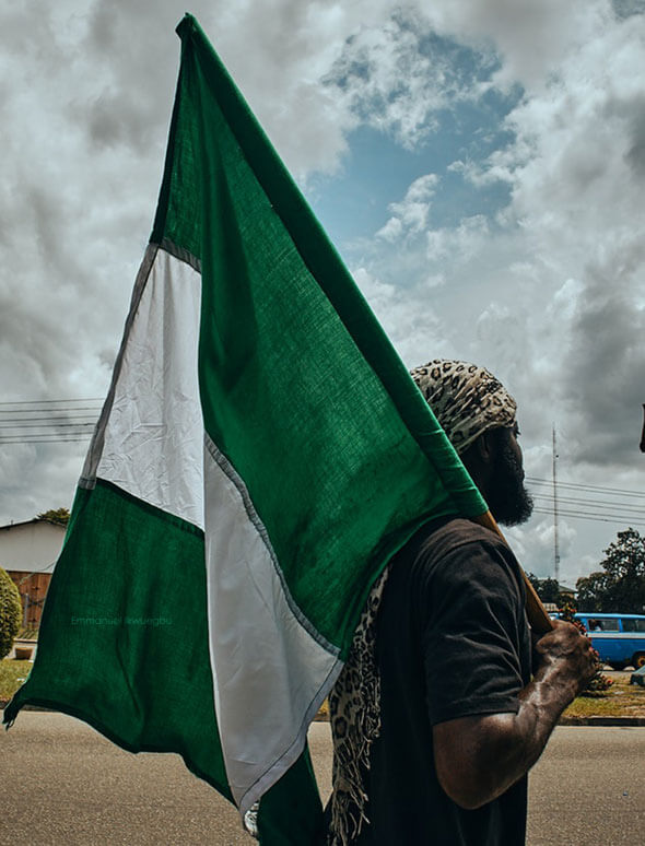 man with Nigerian flag